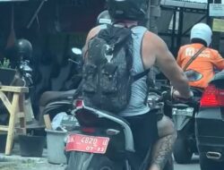 Waduh…..? WNA Terlihat Menaiki Motor Plat Merah