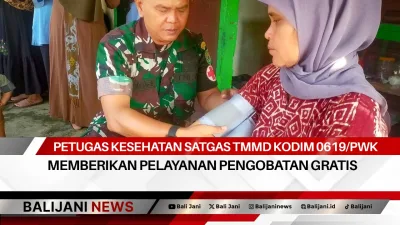 Petugas Kesehatan Satgas TMMD Kodim 0619/PWK Memberikan Pelayanan Pengobatan Gratis