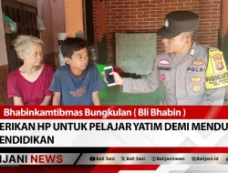 Bhabinkamtibmas Bungkulan ( Bli Bhabin ) Berikan HP untuk Pelajar Yatim Demi Mendukung Pendidikan