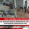 Sigap !! Personel Polsek Singaraja Turun Tangan Bantu Bersihkan Selokan, Tuntaskan Genangan Air