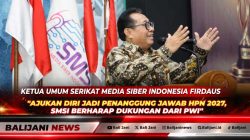 Ketua Umum SMSI Firdaus saat memberikan sambutan dan menyampaikan usulan penanggung jawab HPN 2027 dalam agenda Malam Anugerah SMSI 2026 di Hall Dewan Pers Jakarta