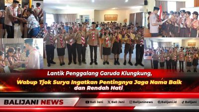 Wakil Bupati Klungkung Tjokorda Gde Surya Putra saat menyematkan tanda Pramuka Garuda kepada Penggalang Garuda Kwarcab Klungkung
