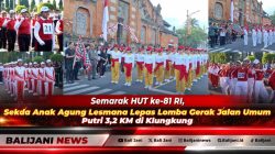 Sekretaris Daerah Kabupaten Klungkung Anak Agung Gede Lesmana saat mengibarkan bendera start melepas Lomba Gerak Jalan Umum Putri 3,2 KM di depan Pendopo Puri Agung Klungkung