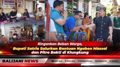 Bupati Klungkung I Made Satria didampingi Ny. Eva Satria saat menyerahkan bantuan stimulan Pitra Yadnya atau Ngaben Massal secara simbolis kepada prajuru desa adat di Klungkung