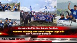 Ketua DPD Partai Demokrat Bali Made Mudarta turun tangan memungut sampah plastik di pantai bersama kader dalam aksi Gerakan Langit Biru