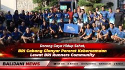 Para pekerja Insan BRILiaN BRI Cabang Gianyar foto bersama dengan antusias dalam kegiatan lari bersama BRI Runners Community di Gianyar