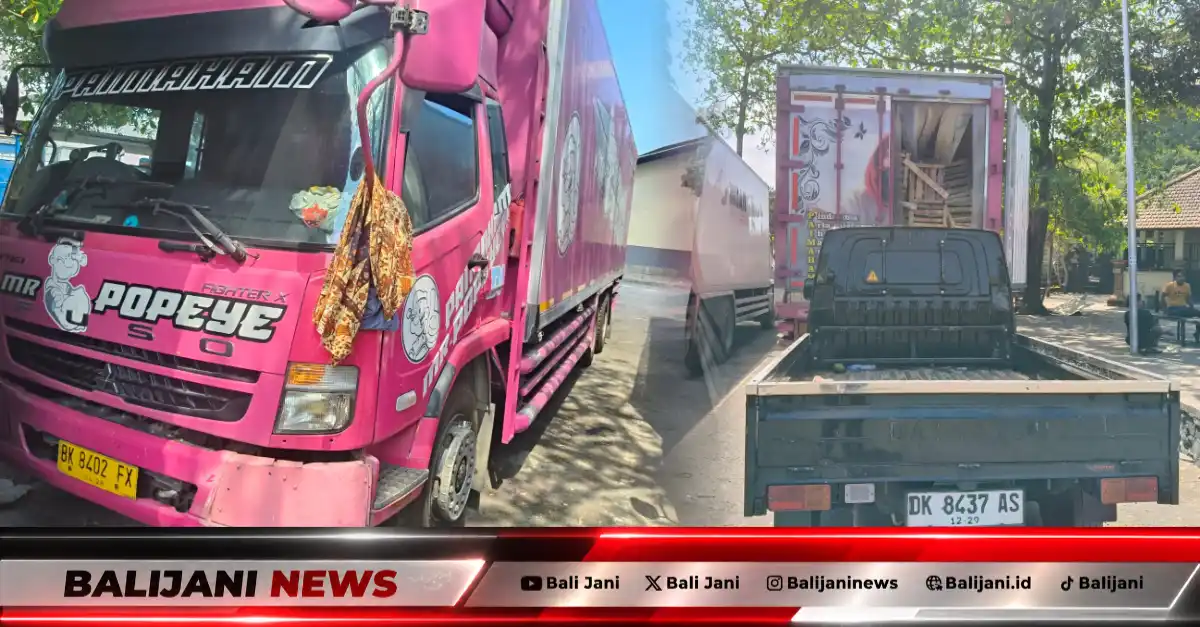 Truk Fuso yang tertahan di area parkir Denpasar akibat terhalang kendaraan lain